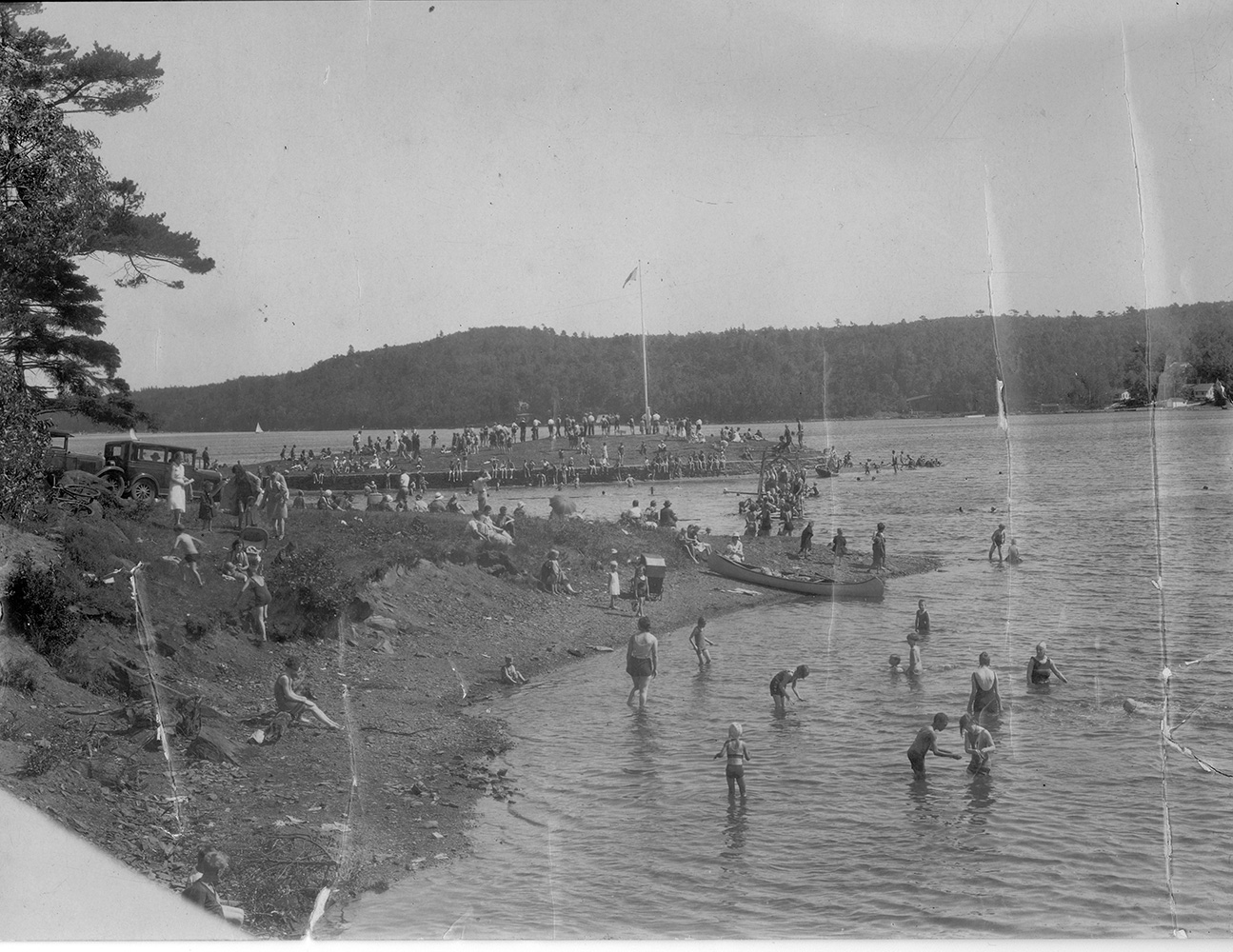 Black and white image of Bathers enjoy the waters of Northwest Arm at Horseshoe Island on Regatta Day, 1912 [102-106-1-7 (cropped from original)]
