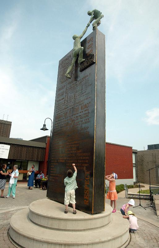 A photo of the sculpture in the plaza of the North Branch Memorial Library, Gottingen Street