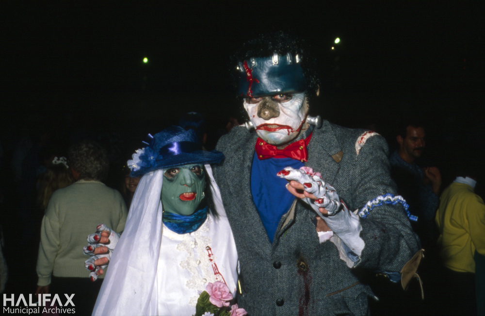 Colour photo of two masked ghouls.