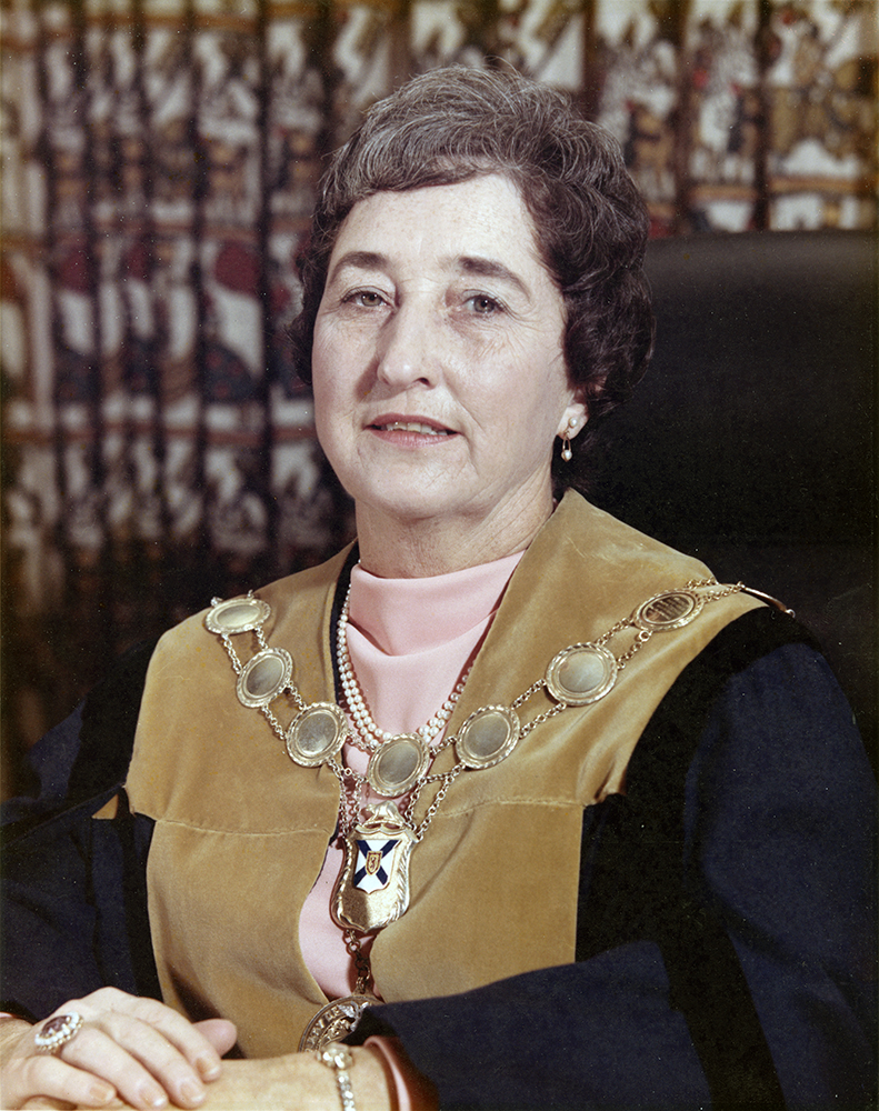 Colour photograph of a woman wearing the robes and chain of office for the City of Dartmouth