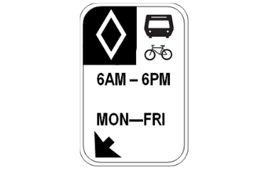 a white diamond on a black background, a bus icon and a bike icon. 6AM-6PM, MON-FRI. This sign indicated that this is a bus lane during the specified hours.
