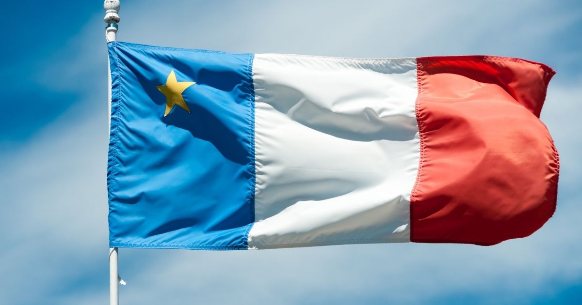 Acadian flag flying