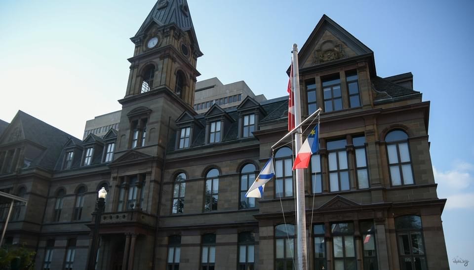 Acadian flag flying at the Halifax City Hall
