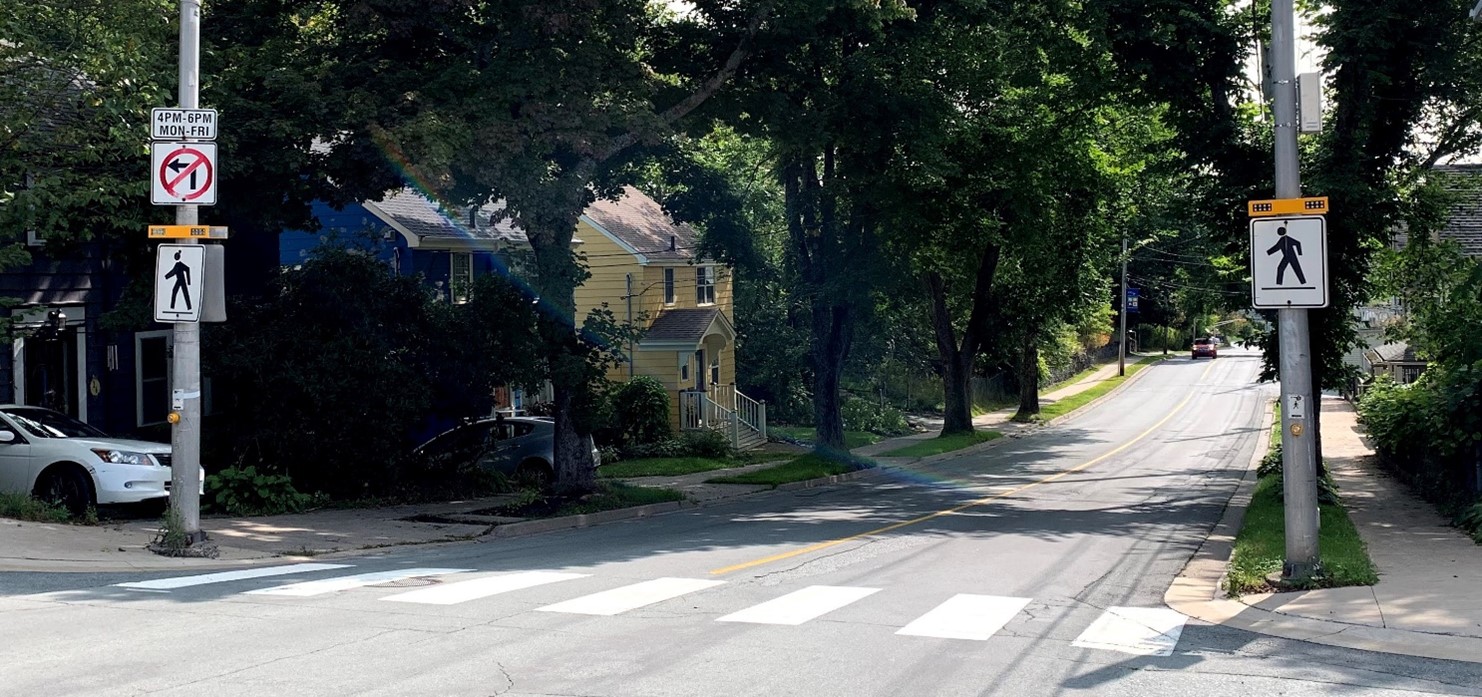 Rectangular Rapid Flashing Beacons installed at a crosswalk on Tulip Street in Dartmouth