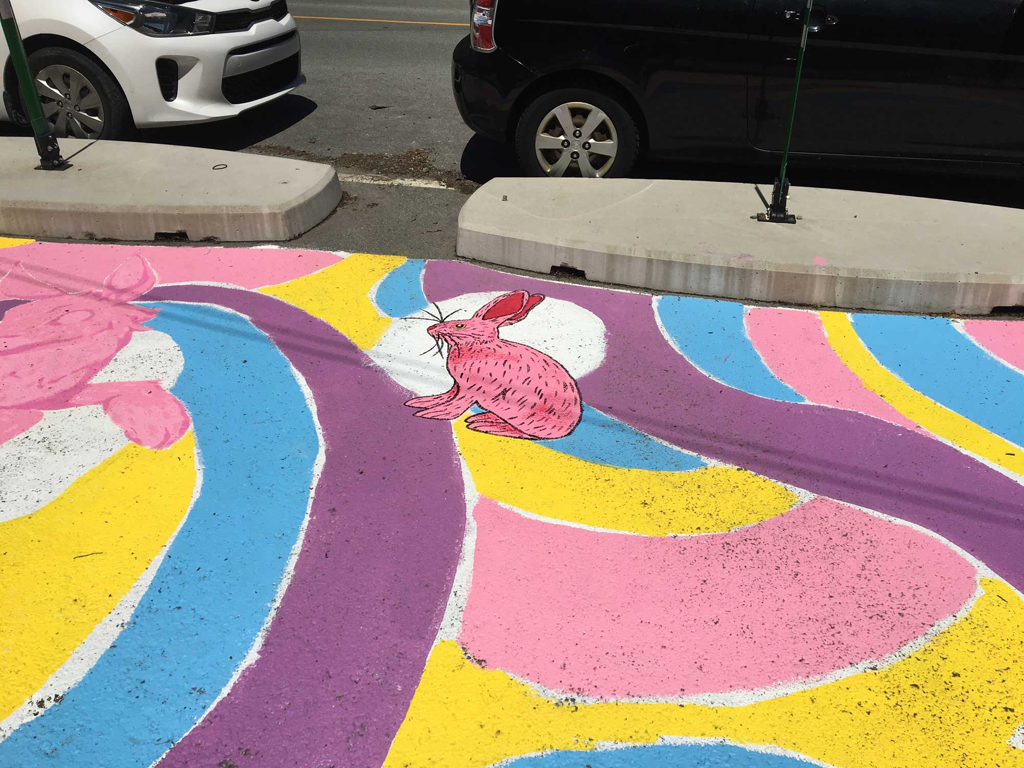 Colourful street mural with rabbits