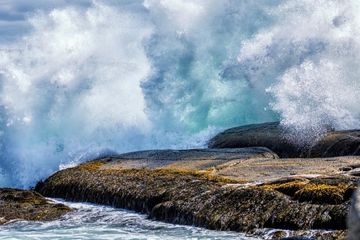 waves crashing into rocks