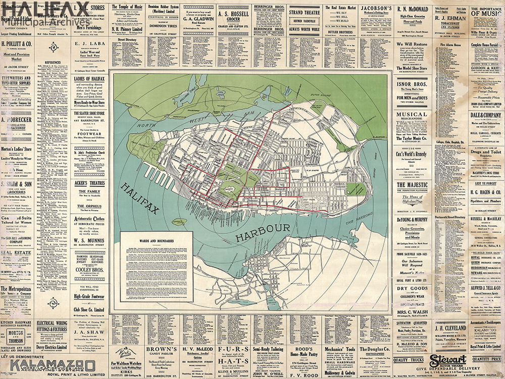 Coloured map of Halifax peninsula and part of Dartmouth surrounded by business advertisements, fire box numbers, a street index, and a geographic description of Halifax's wards and boundaries.