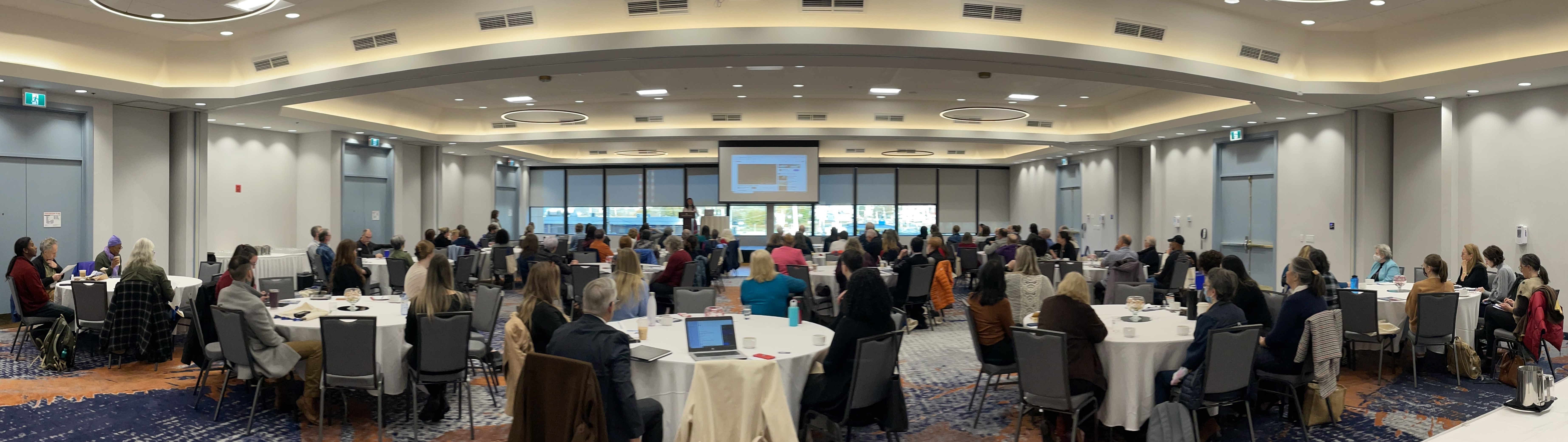 Conference delegates gather in the ballroom for keynote presentation 