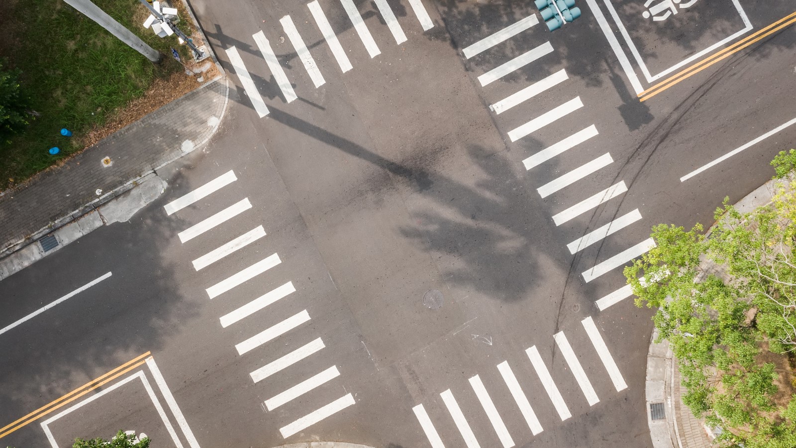 Overhead image of a traffic intersection.