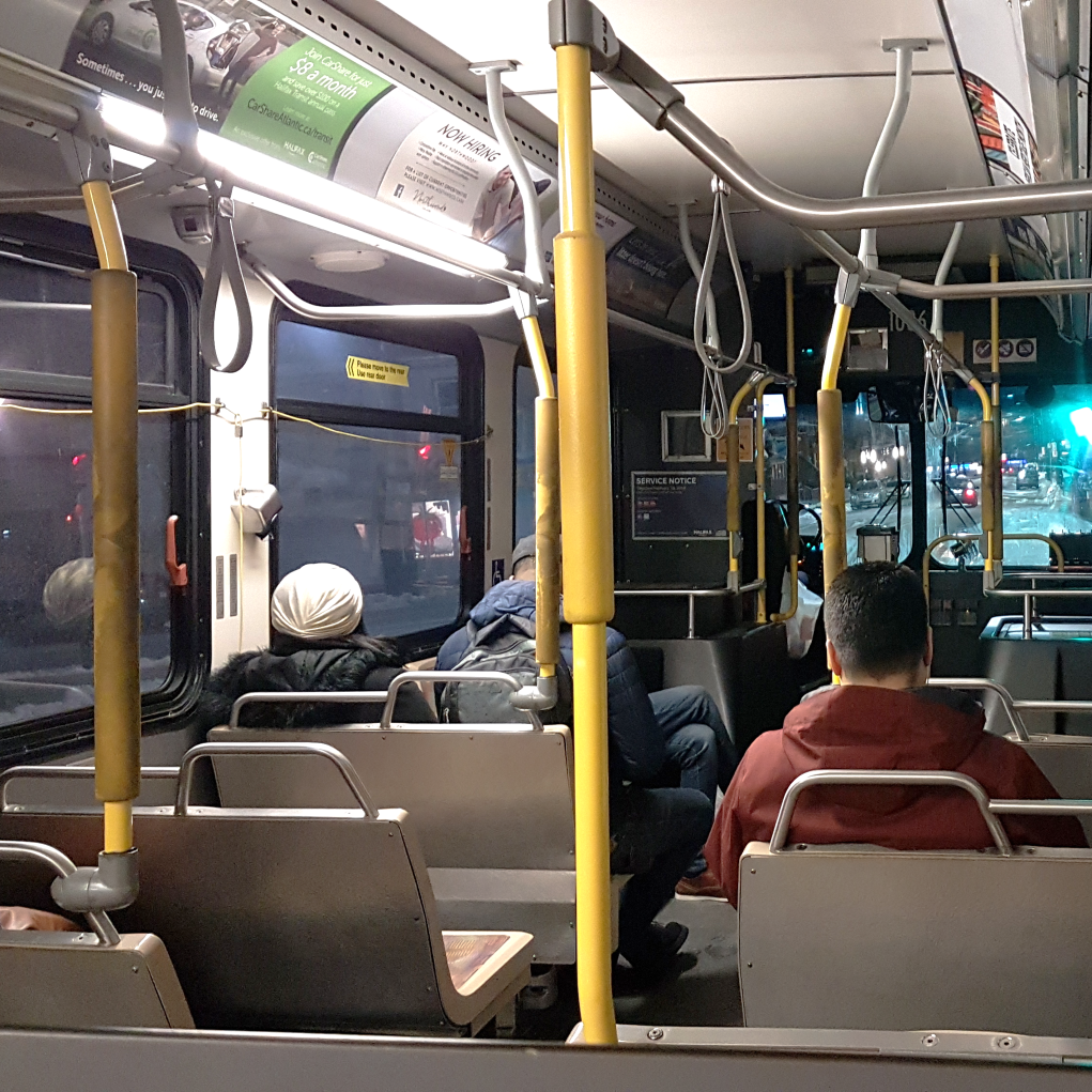 Interior of a bus with passengers