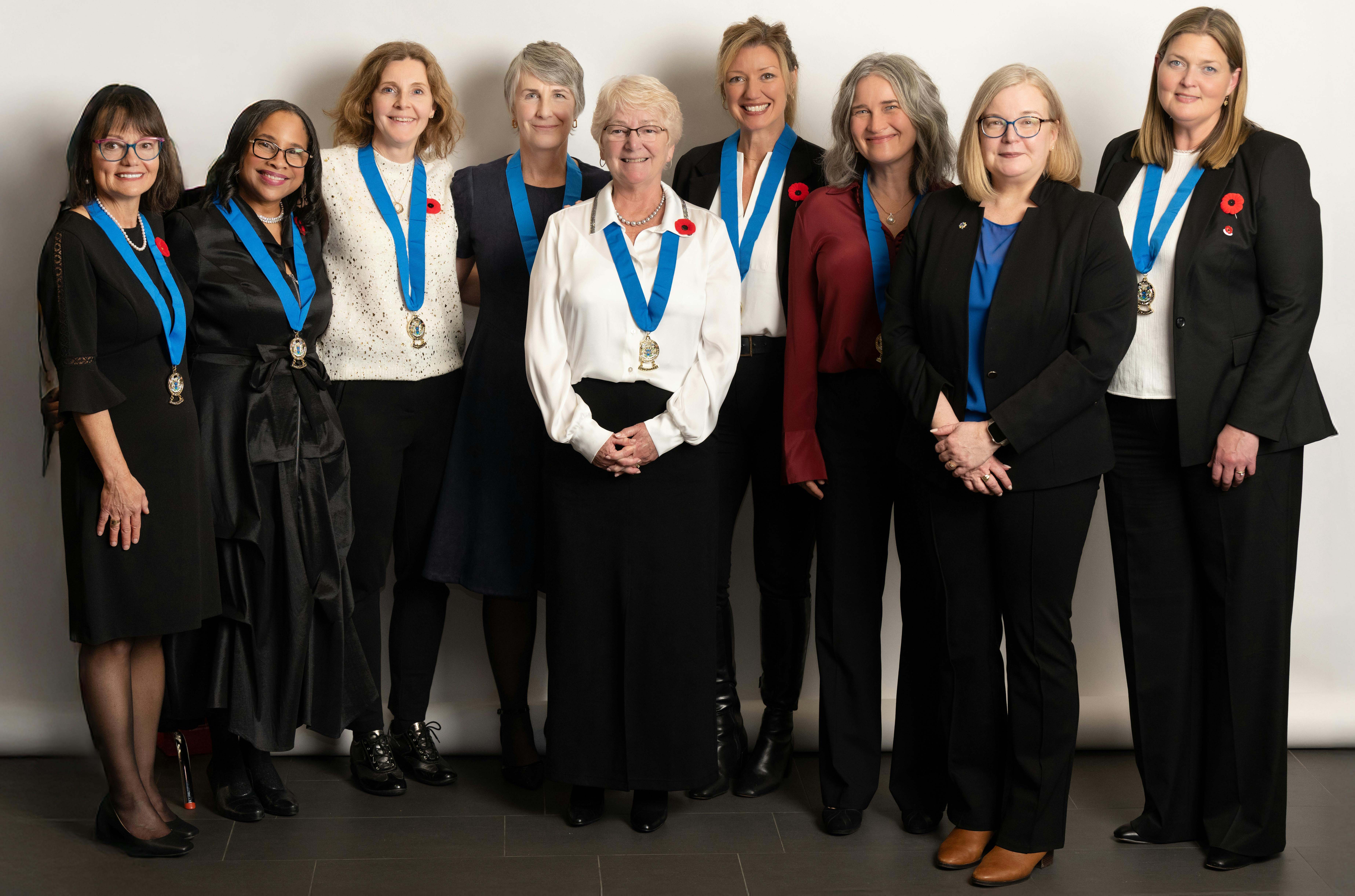 colour photo of 9 women standing