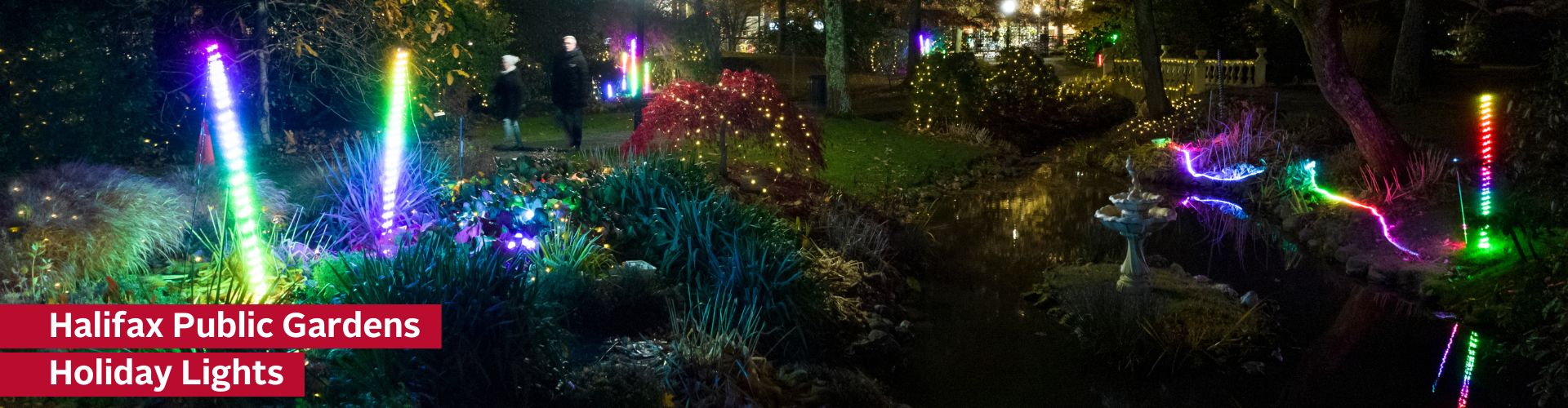 A nighttime photo of the Halifax Public Gardens with holiday lights aglow. Text reads: "Halifax Public Gardens - Holiday Lights".