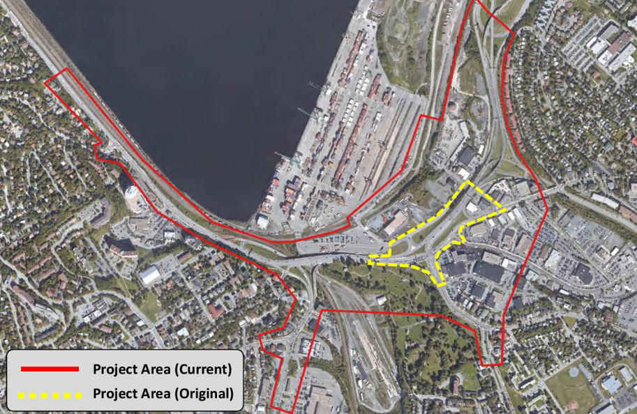 An aerial photo of the Windsor Street Exchange and surrounding area with a red line around the approximate project area, which includes portions of Bedford Highway, Joesph Howe Drive, Dutch Village Road, Windsor Street, Connaught Avenue, Strawberry Hill, Lady Hammond Road, along Hwy 111 toward the MacKay Bridge before returning along Africville Road, along the Fairview Terminal and rail lines back up Bedford Highway to the starting point. A dotted yellow line shows a smaller previous project area.