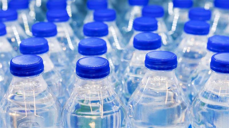 Water bottles with blue caps.