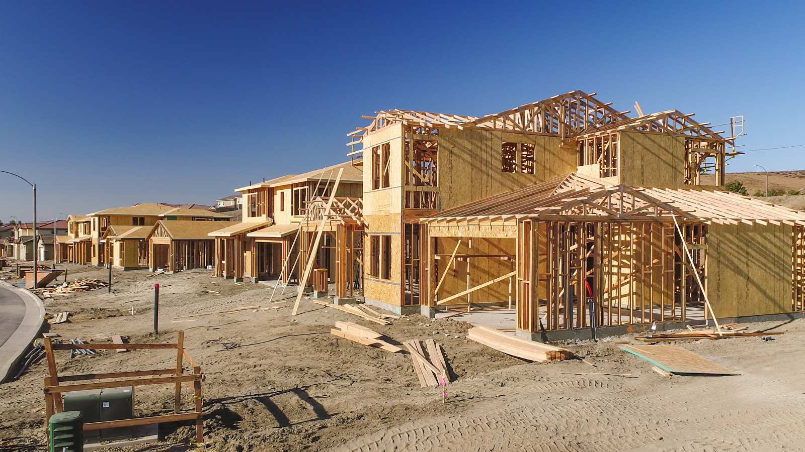 ID: Photo of residential homes under construction.