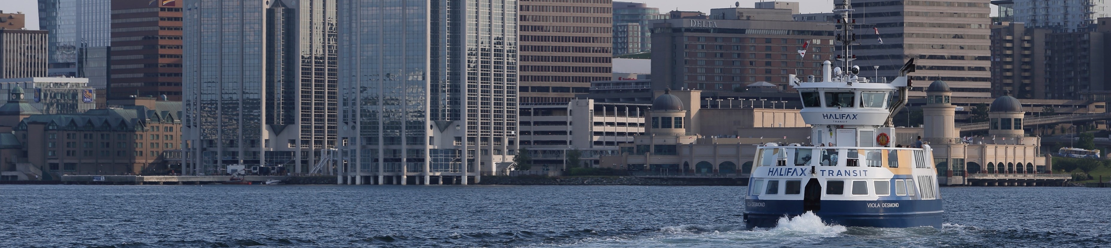 The Halifax Transit Ferry crossing the Halifax Harbour toward Halifax.