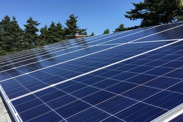 close up of a solar panel on the roof top of a house