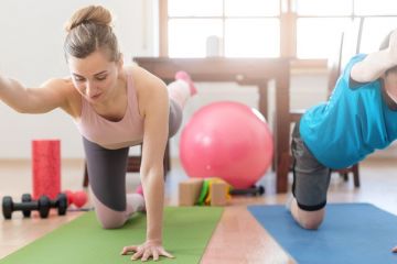 People doing yoga poses