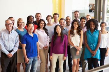 a group shot of employees standing 