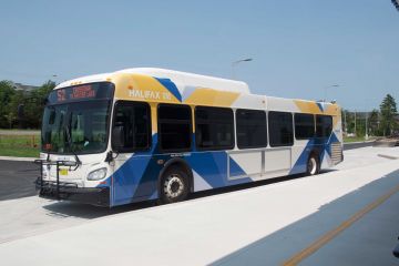 The #52 bus stopped at a bus stop