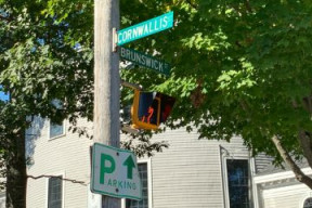A pole with street signs for Cornwallis and Brunswick