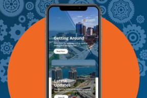 A screencap of the main screen on the Cogswell District app shows an aerial photo and a call-out for the Getting Around section