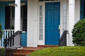 Image of a house with a blue door.