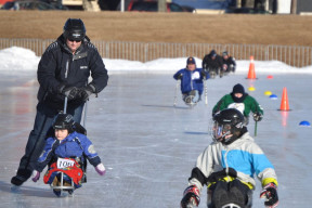 Children using sledges at the Emera Oval