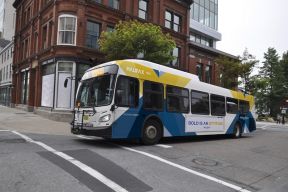 The route 4 bus is seen on the corner of Hollis and Duke Streets.