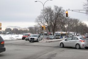 Buses at a traffic light on Robie Street