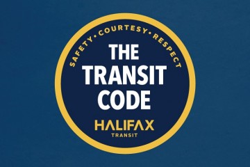 The Transit Code Seal on a solid blue background