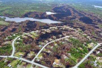 Aerial view Upper Tantallon Nieghbourhood showing the burn scar from the 2023 wildfire.